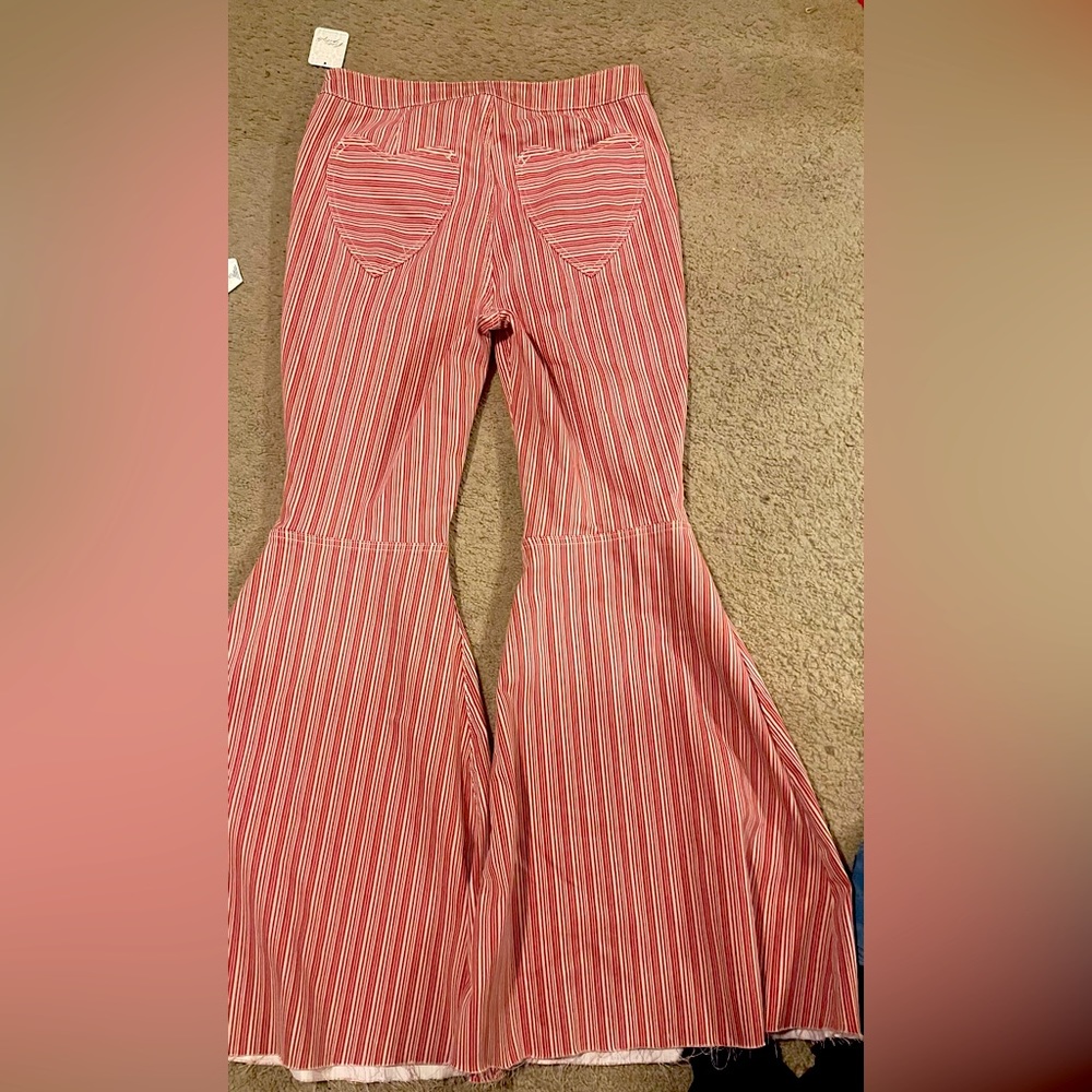 Free People- Stylish Wide Leg Red & White Striped pants. Heart shaped pockets.